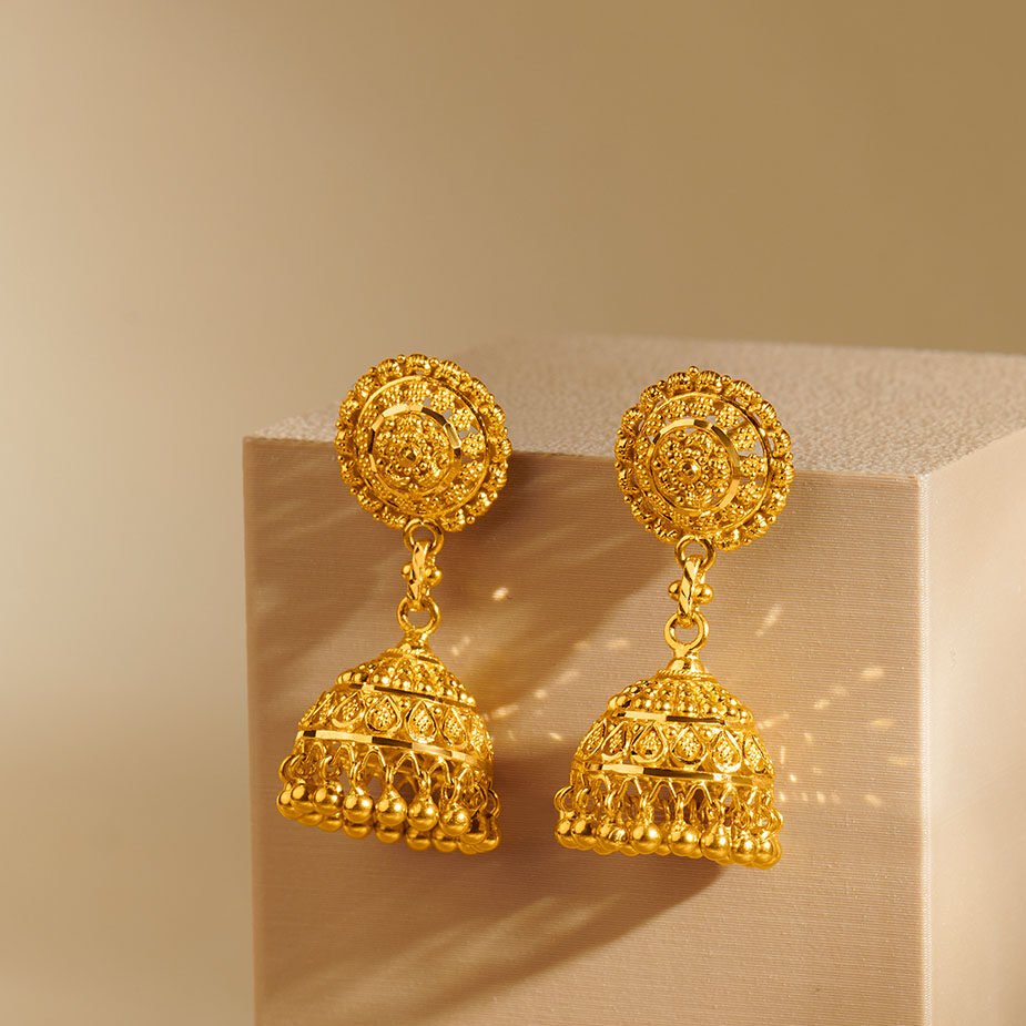 CHD gold jhumka close-up